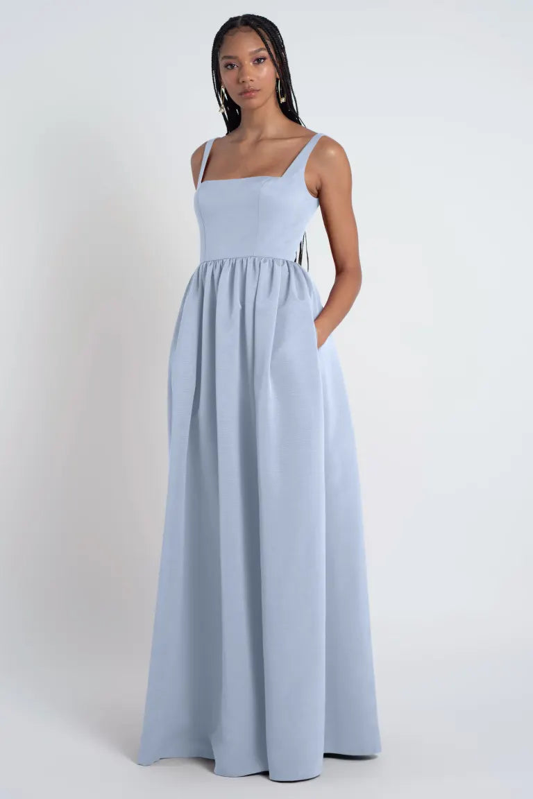 http://bellabridesmaids.com/cdn/shop/files/Erica_whisper_blue_3_jpg_768x.webp?v=1699041847
