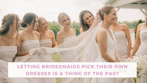 bridesmaids with bride outdoors