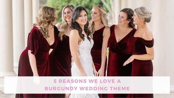 Bride in a white lace gown smiles with five bridesmaids in burgundy dresses outdoors; banner reads “5 reasons we love a burgundy wedding theme.”