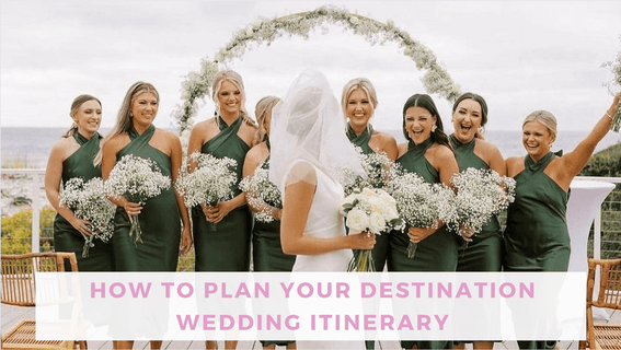 Bride and bridesmaids standing at altar on the beach