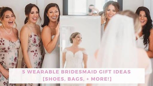 Bridesmaids smiling around a mirror in which the bride in her white wedding gown is reflected in. 