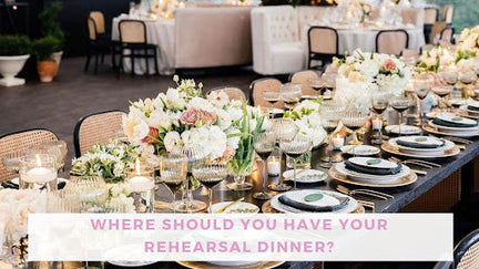 Tables set beautifully for a rehearsal dinner indoors
