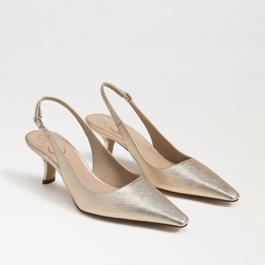 The Bianka Slingback Pump in Gold Leaf Leather features a pointed toe, buckle closure and a 2.4 inch heel.